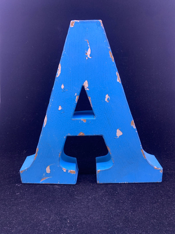 DISTRESSED BLUE METAL "A" WALL HANGING.