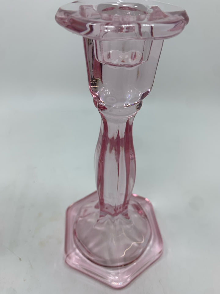 2 PINK GLASS CANDLE HOLDERS.