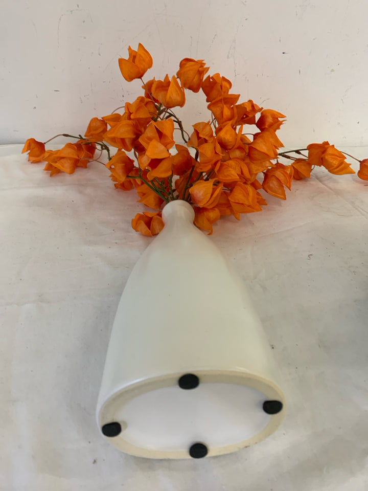 WHITE SKINNY NECK VASE W/ORANGE FLOWERS.