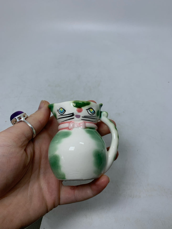 MINI CAT SHAPED CREAMER W/ GREEN DETAILS .