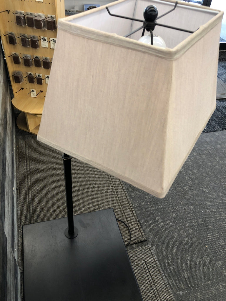 BLACK RECTANGLE SIDE TABLE W BOTTOM STORAGE AND ATTACHED LAMP.
