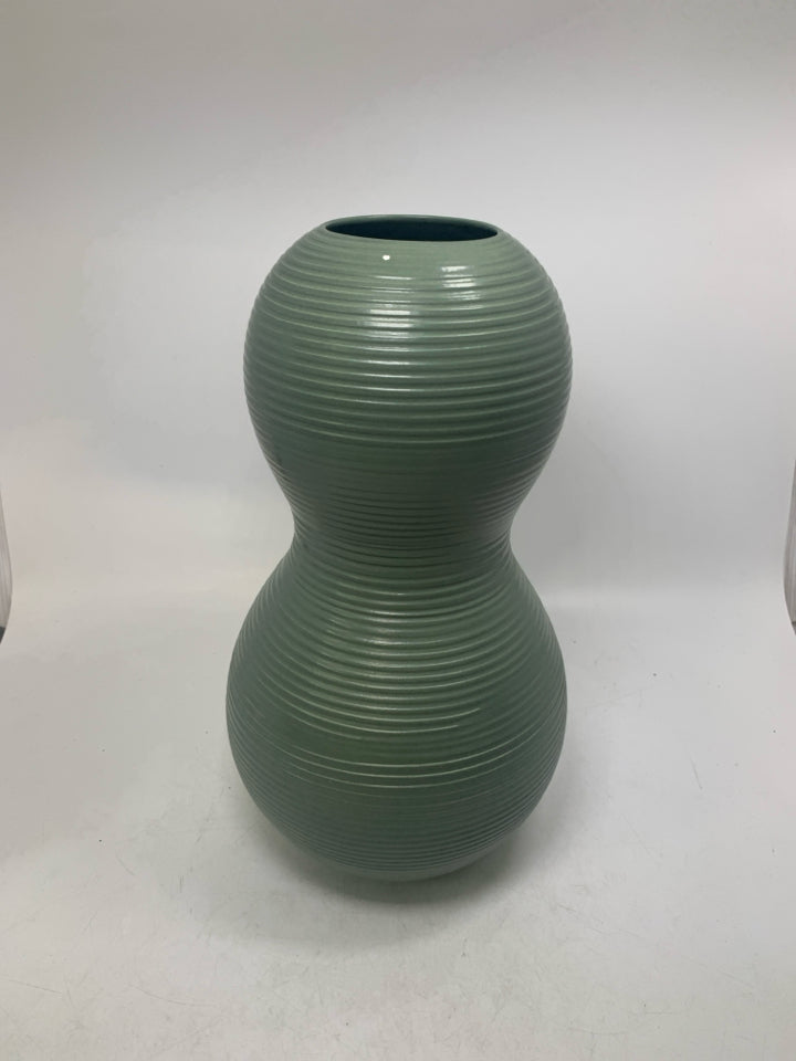 LARGE RIBBED FUNKY SHAPED VASE.