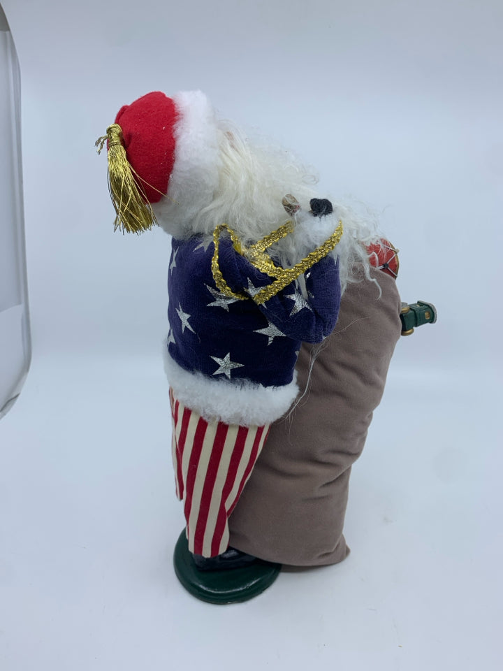 BYERS' CHOICE PATRIOTIC SANTA W TOYS.