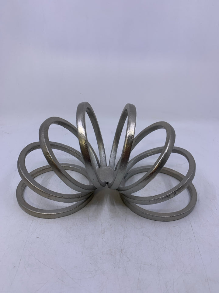 METAL SLINKY DESK DECOR.