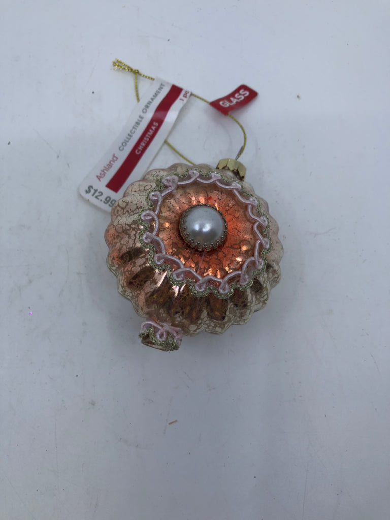 PEACH ROUND GLASS ORNAMENT.