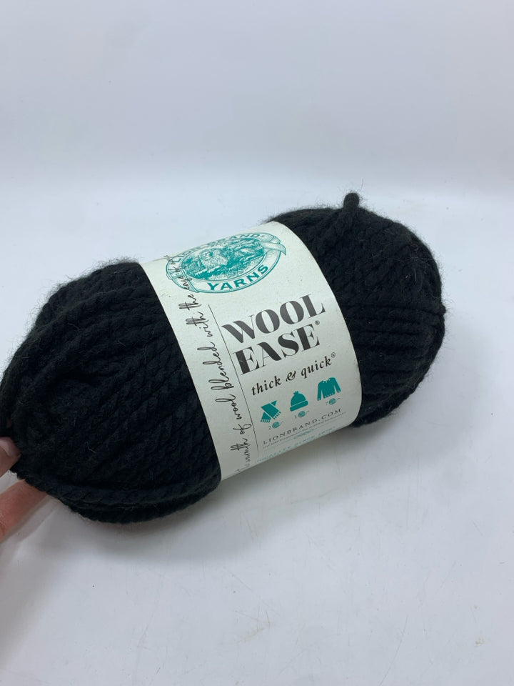 LION BRAND BLACK WOOL YARN.