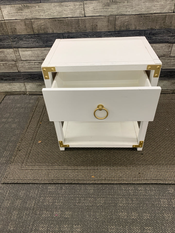 WHITE LOW TWO TIER SIDE TABLE W/ GOLD HARDWARE CIRCLE HANDLES.