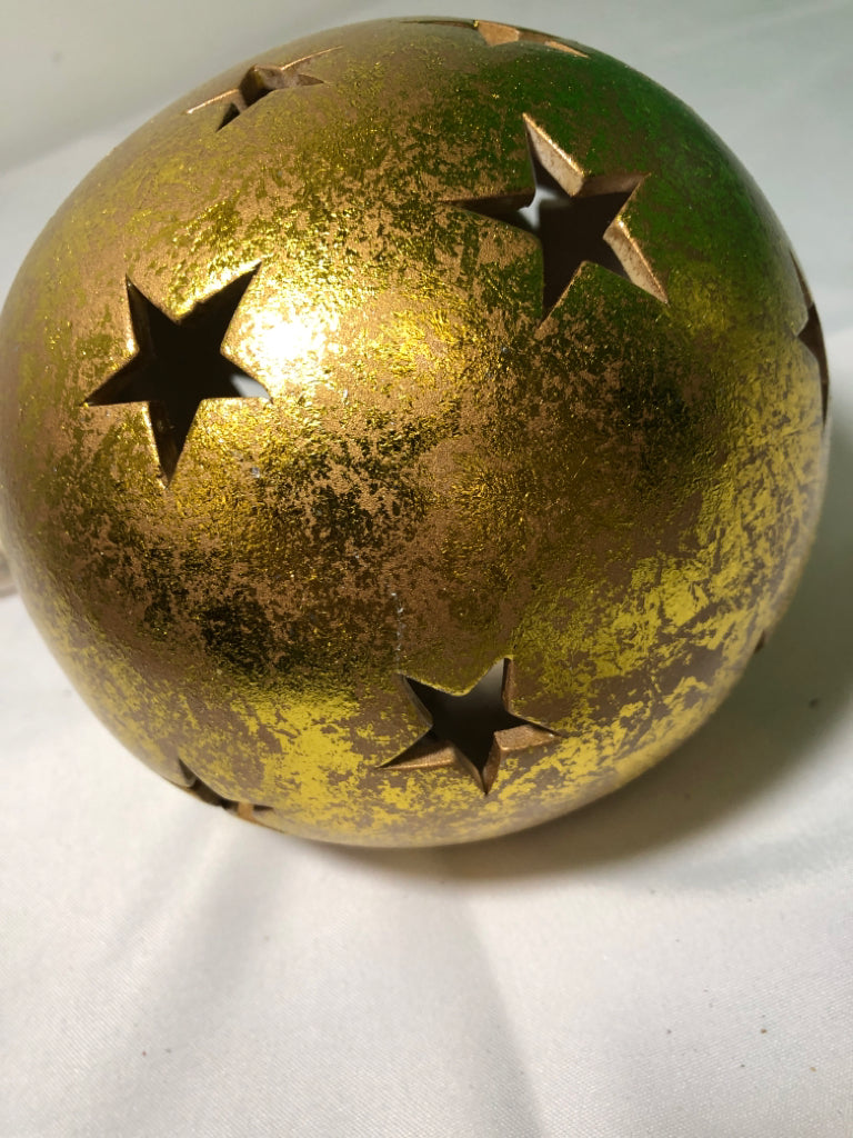 GOLD CERAMIC LAMP W/ STAR PIERCED CUTOUTS.