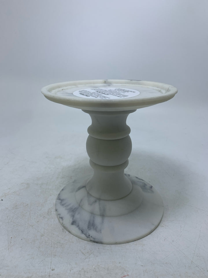 FAUX FOOTED MARBLE PILLAR CANDLE HOLDER.