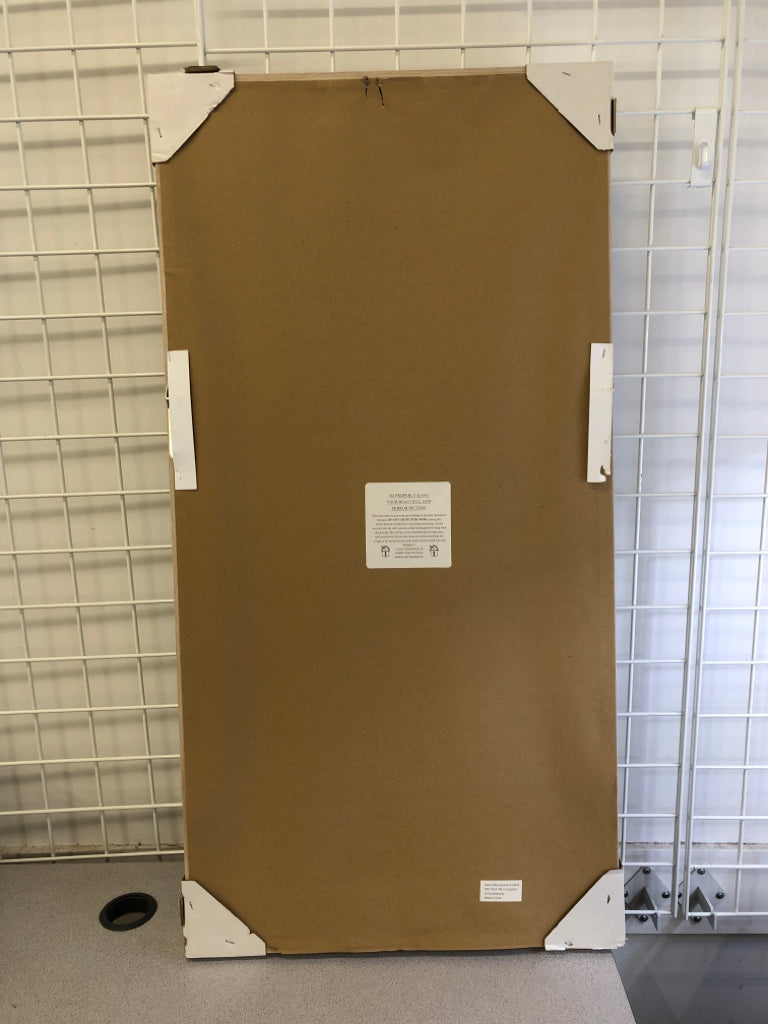 LARGE LEAF PHOTO IN LIGHT WOOD FRAME.