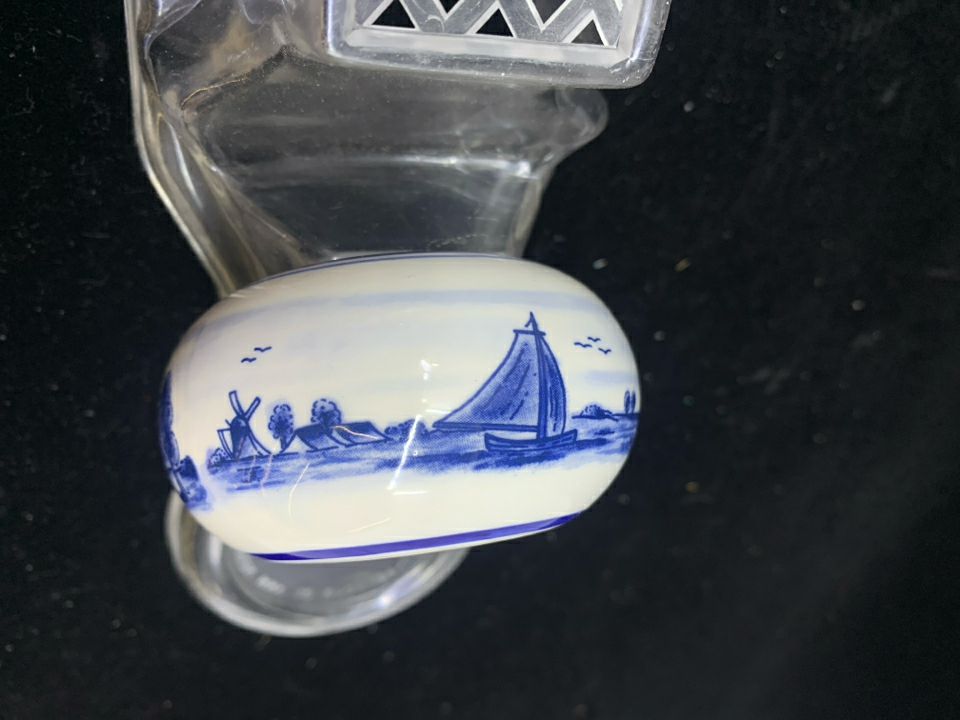 2 ROUND BLUE/WHITE WINDMILL TEA LIGHT HOLDERS.