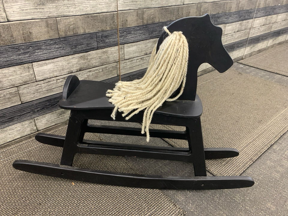 BLACK WOOD ROCKING HORSE W/YARN HAIR.