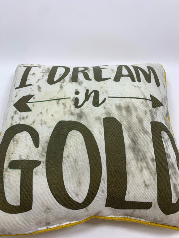I DREAM IN GOLD ACCENT PILLOW.