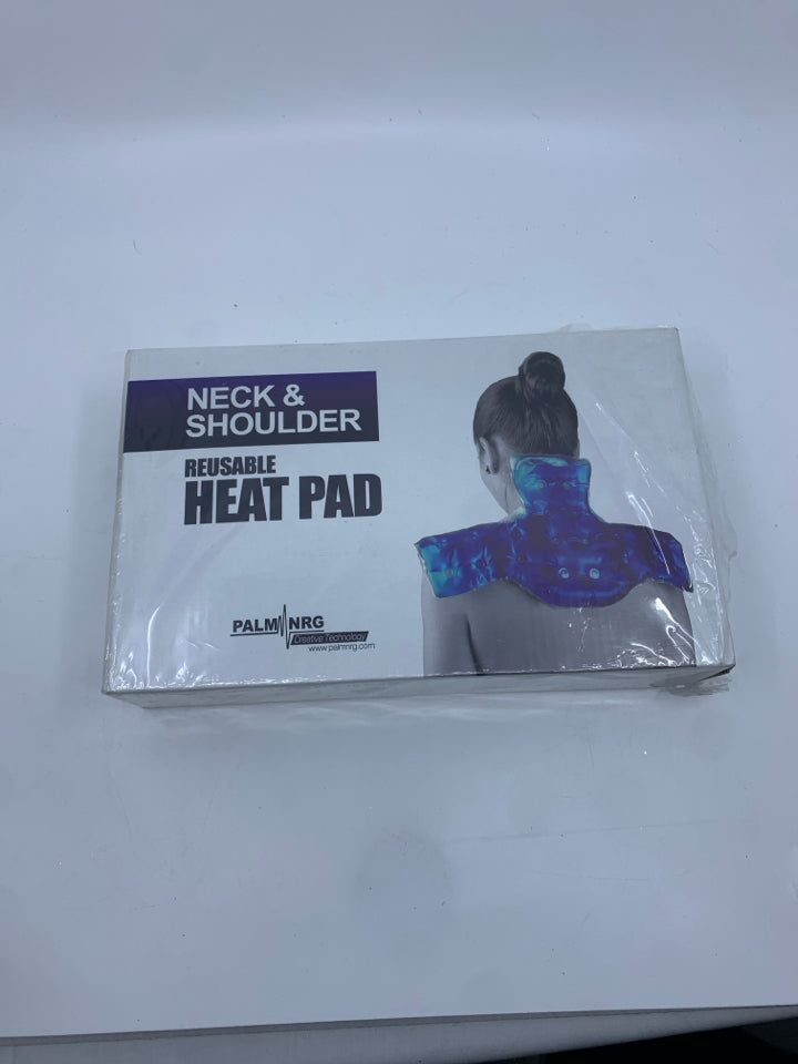 NIB REUSABLE HEAT PAD.