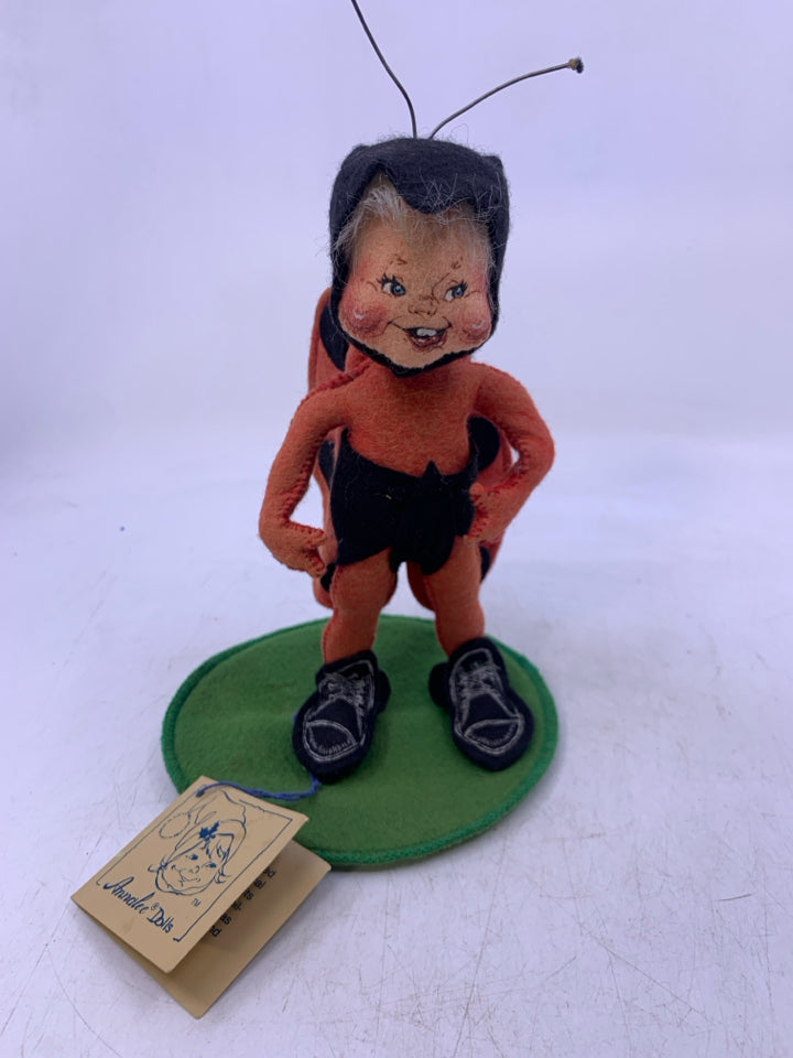 PERSON DRESSED AS LADY BUG.