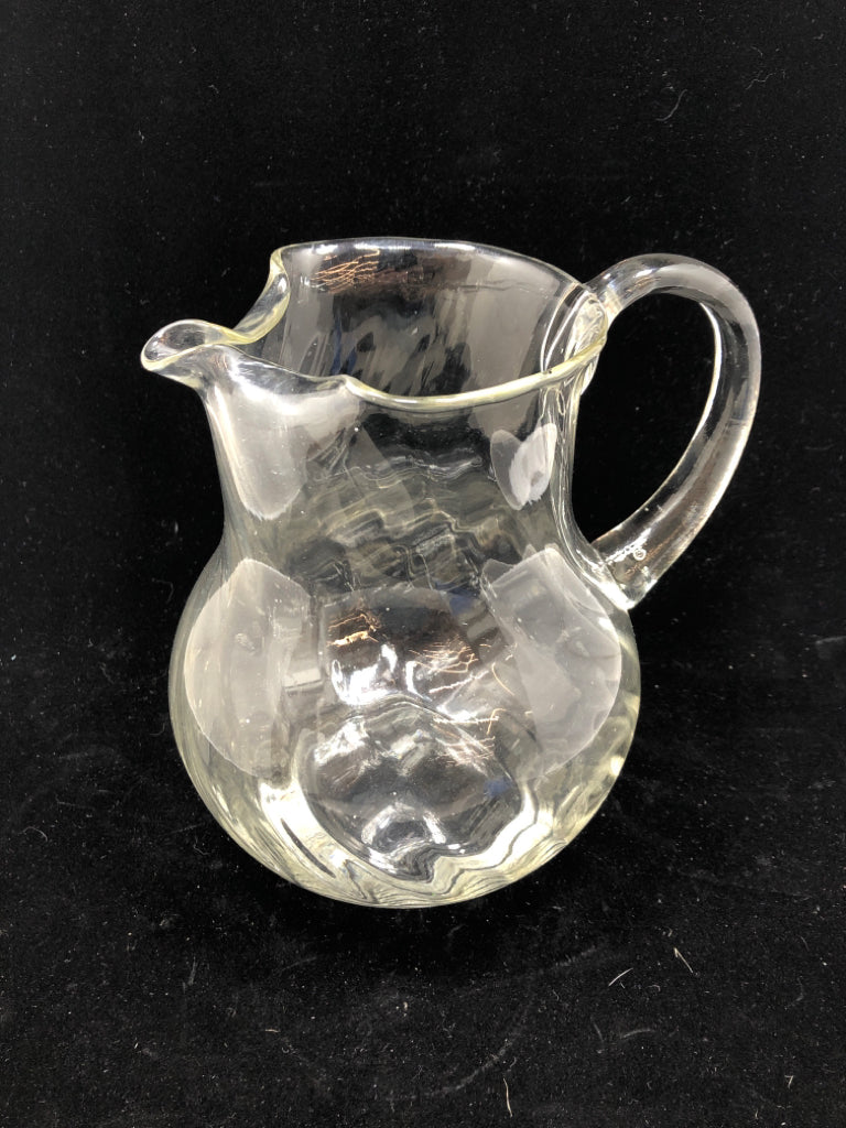 CLEAR SWIRL GLASS WITH ICE LIP.