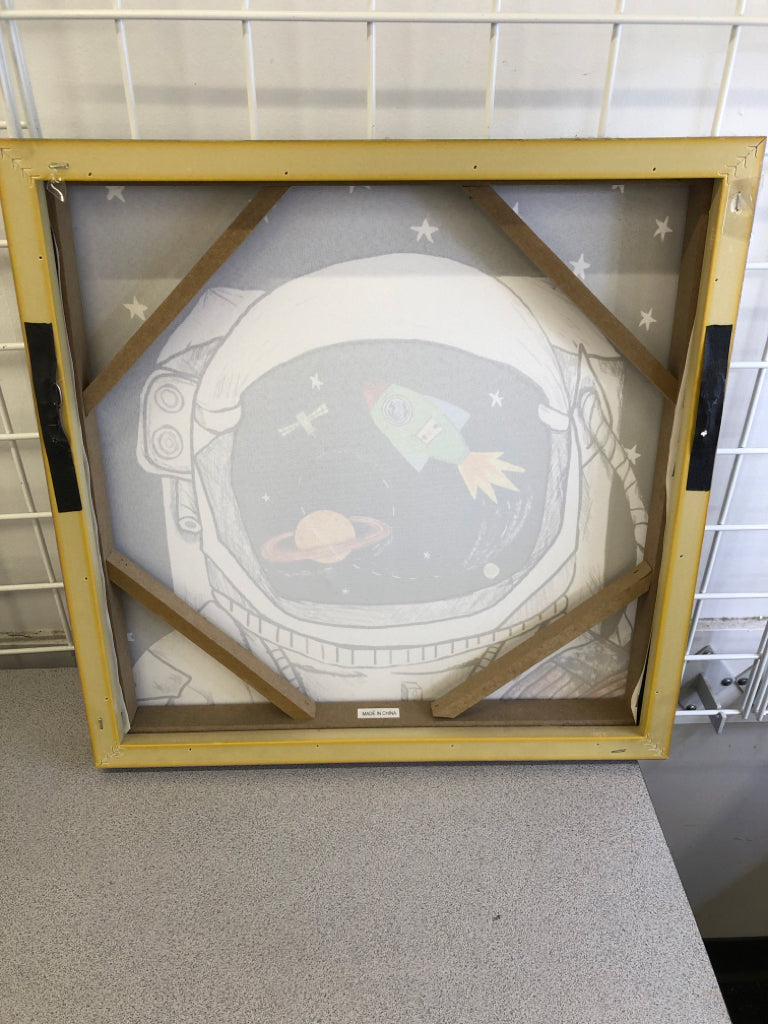 ASTRONAUT CANVAS IN GREY WOOD FRAME.