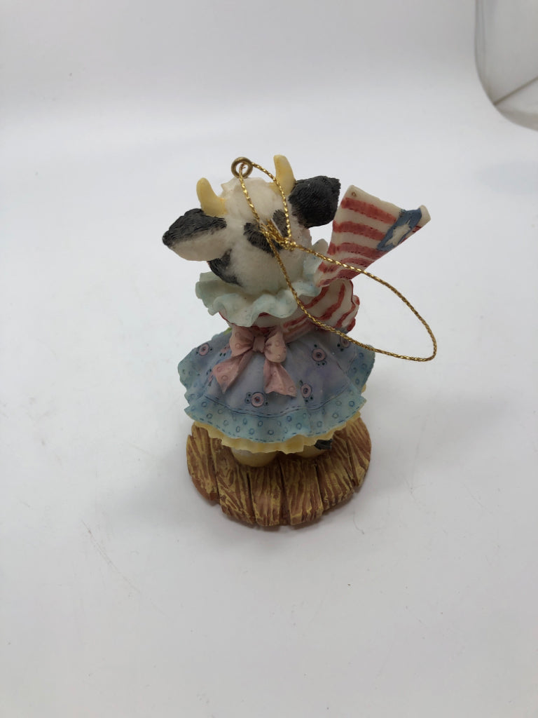 AMERICANA COW ORNAMENT.