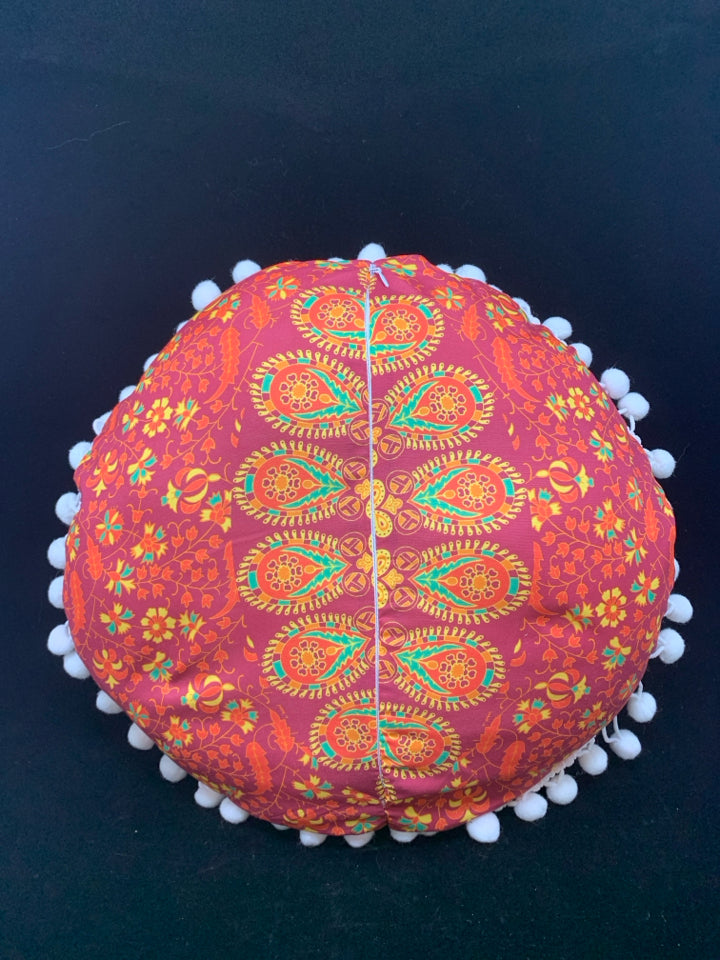 RED FLORAL ROUND ACCENT W/WHITE POM POMS.
