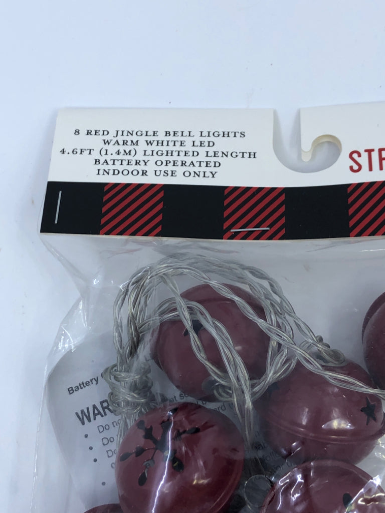 NIP RED LIGHTED JINGLE BELLS.