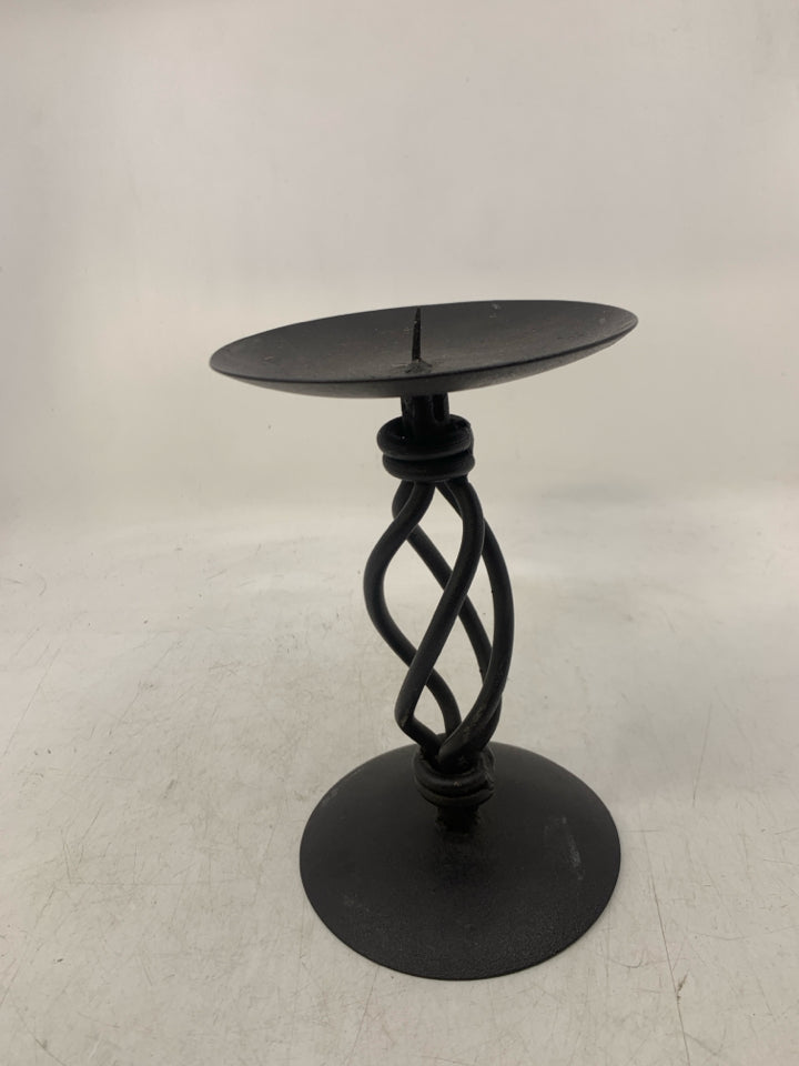 BLACK SCROLL METAL PILLAR CANDLE HOLDER.