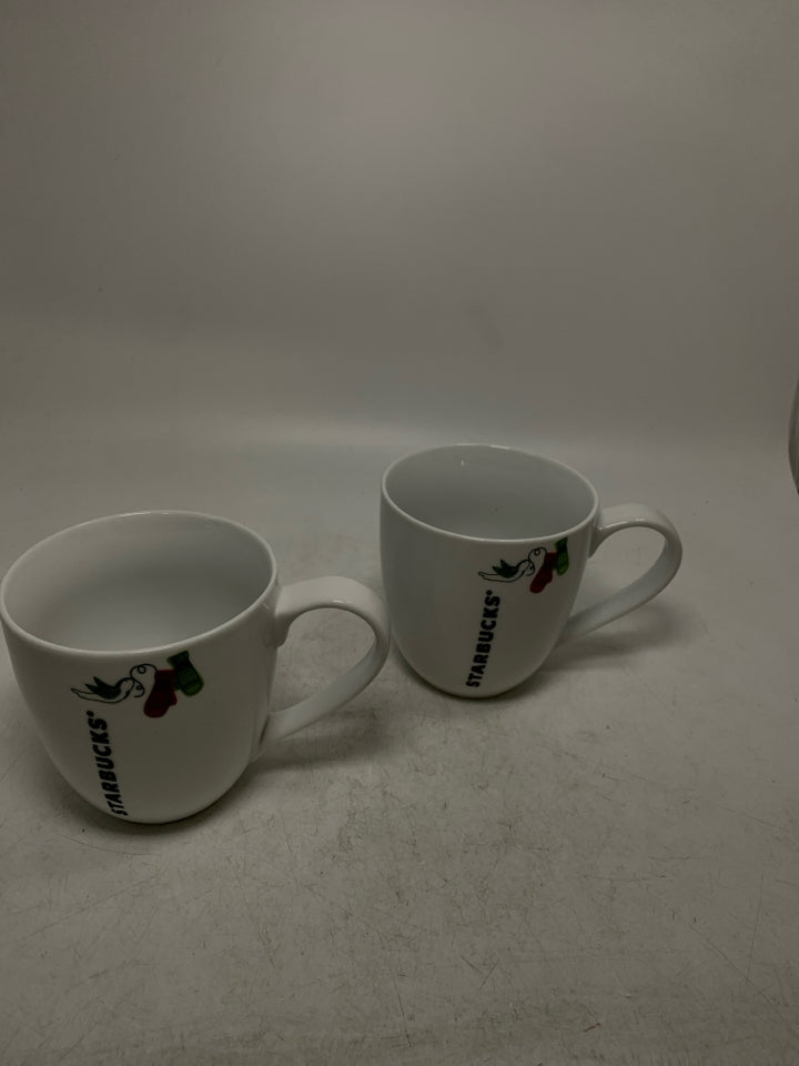 2 WHITE STARBUCKS MUGS W/ MITTENS & DOVE.
