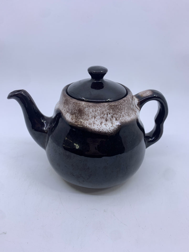 BLACK W WHITE POTTERY TEAPOT.