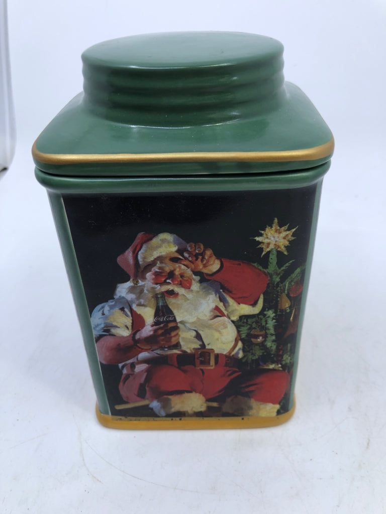 NIB GREEN SANTA STONEWARE CANISTER WITH LID.