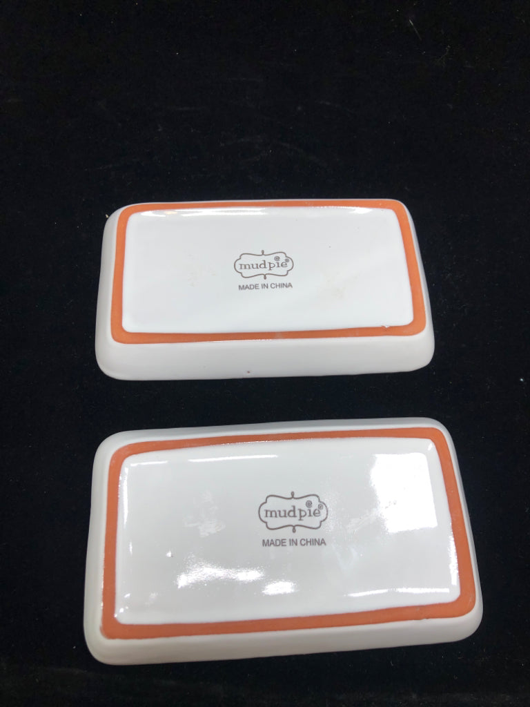 2 WHITE GLAZED CERAMIC TRAYS W/EMBOSSED FLOWERS.