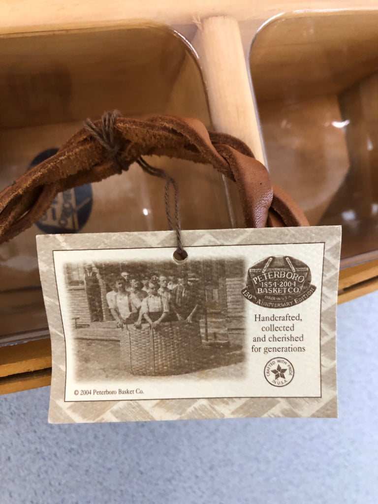 BUFFET ORGANIZER BASKET W/PLASTIC LINER AND BRAIDED HANDLES.