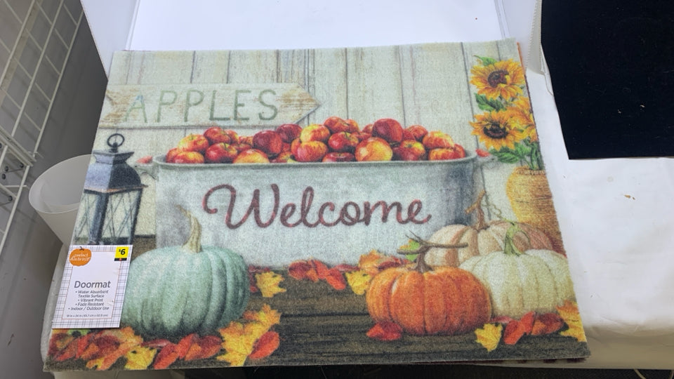 WELCOME APPLES DOORMAT.