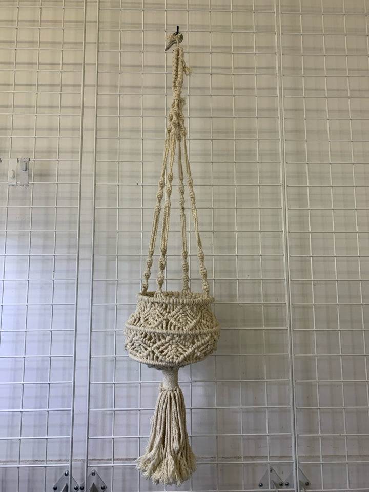 MACRAME HANGING PLANT HOLDER.