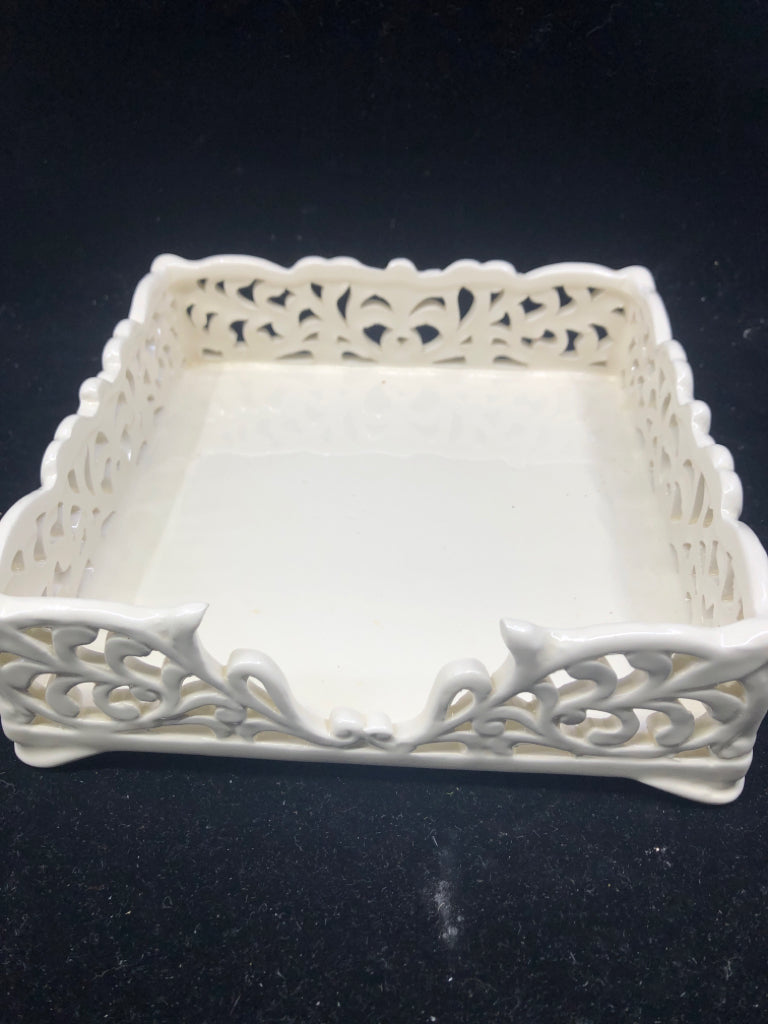 WHITE SCROLL CUT OUT NAPKIN HOLDER.