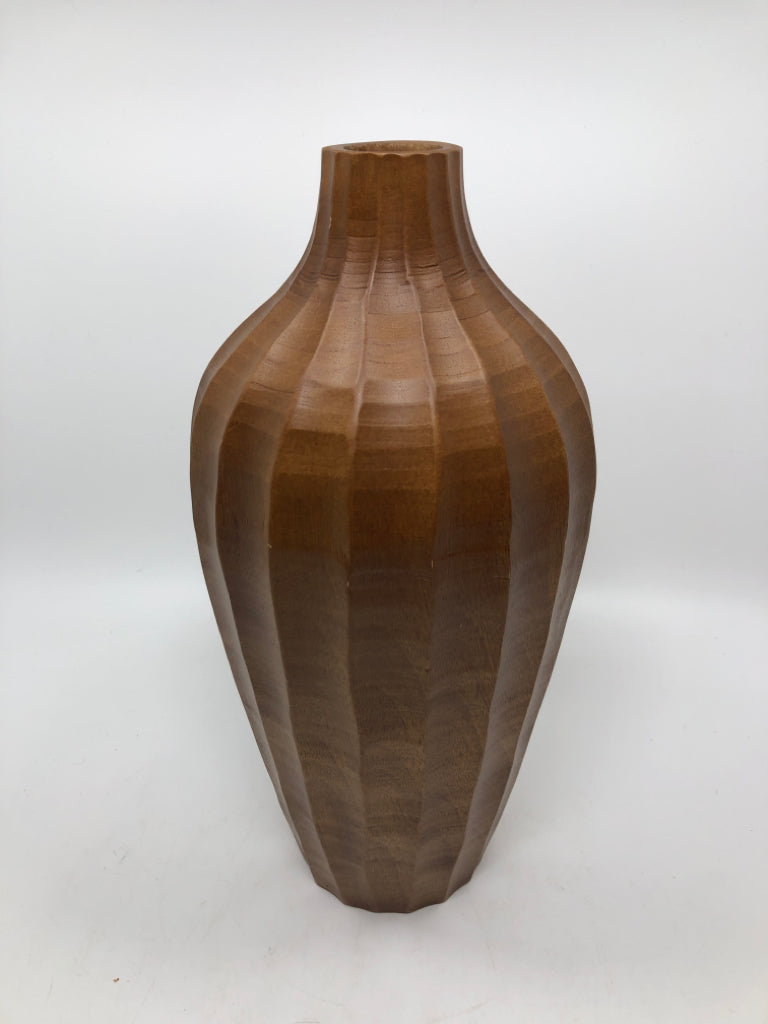 TEXTURED WOODEN VASE.