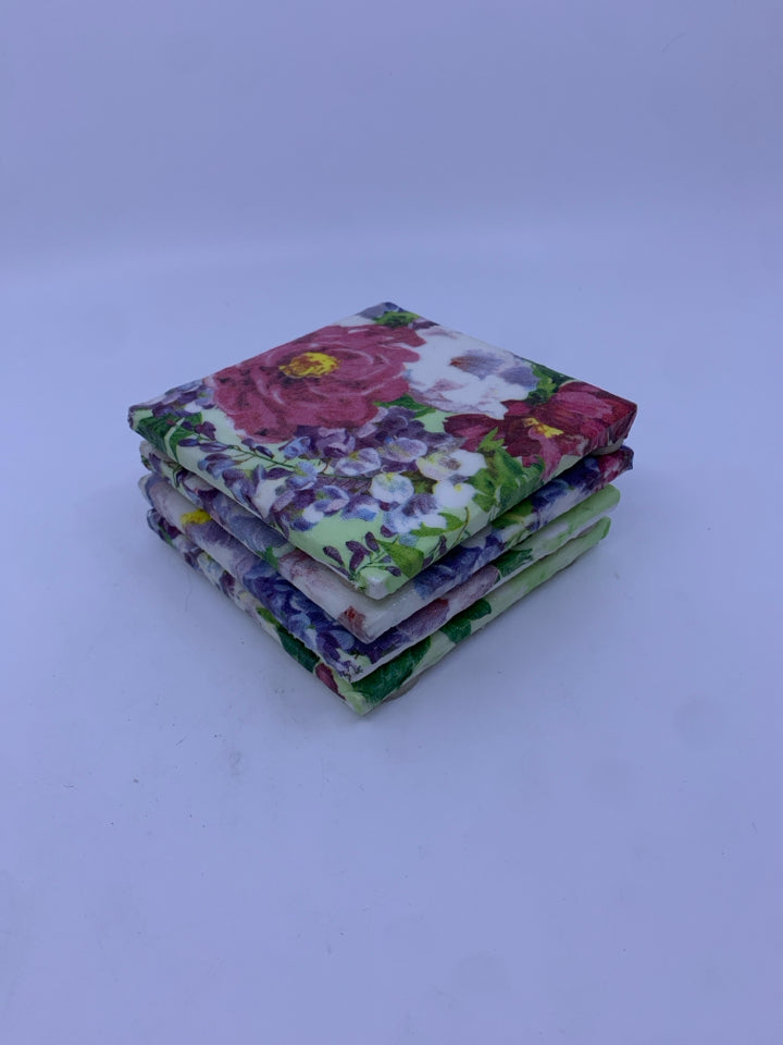 4 PINK FLORAL CERAMIC COASTERS.
