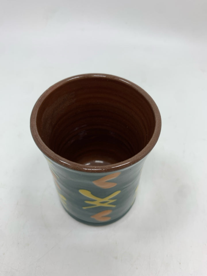 ORANGE HEART TERRA COTTA CUP.