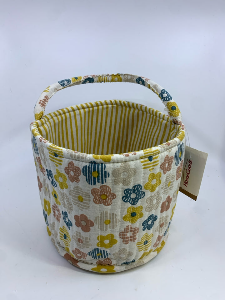 FLORAL FABRIC BIN W/YELLOW STRIPES ON INSIDE.
