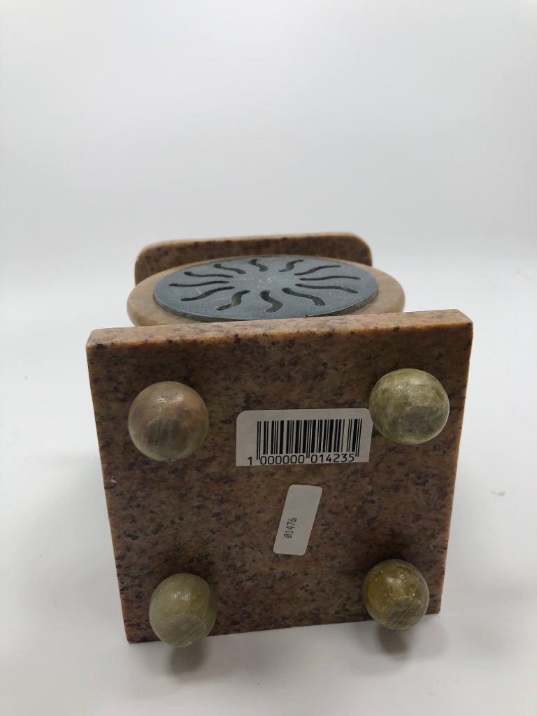 MARBLE CANDLE HOLDER W/METAL SUN DECALS.
