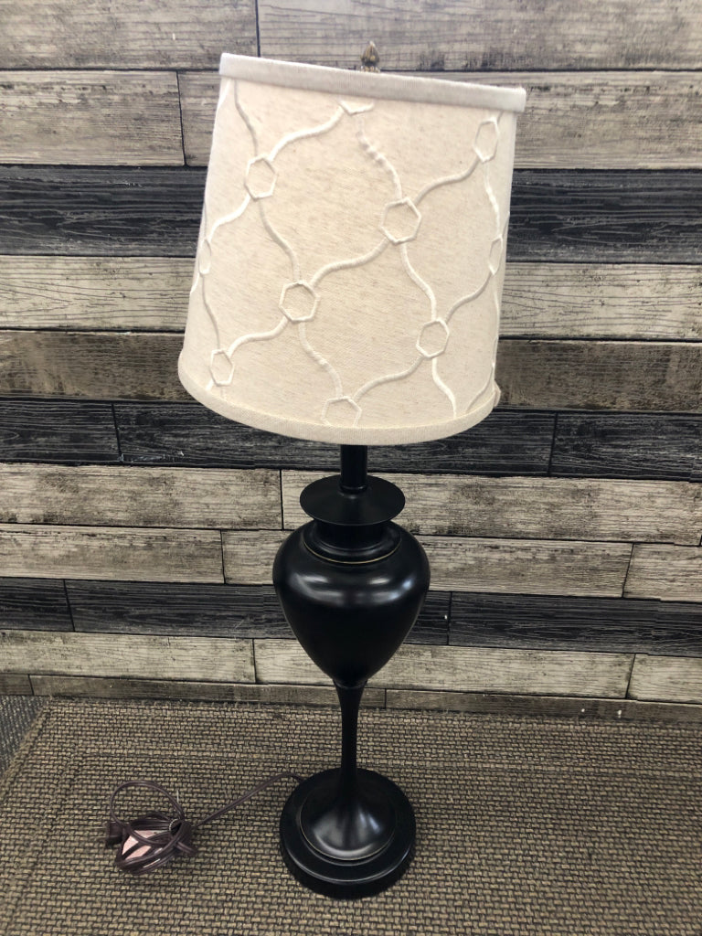 TALL METAL BASE W/ TAN TEXTURED SHADE.