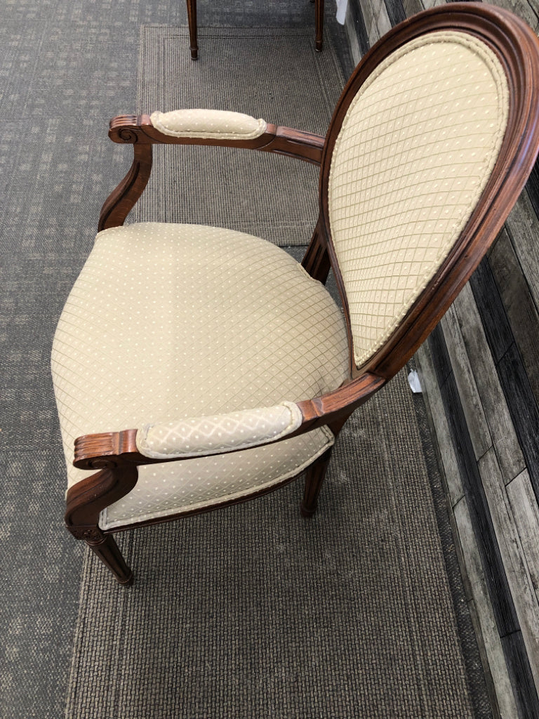 VTG WOODEN CHAIR W/GREEN DOTTED PATTERN.