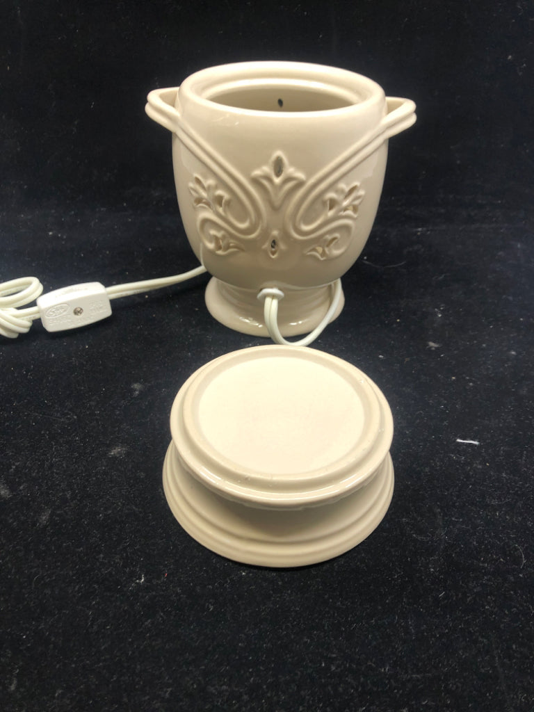 CREAM EMBOSSED WAX WARMER.