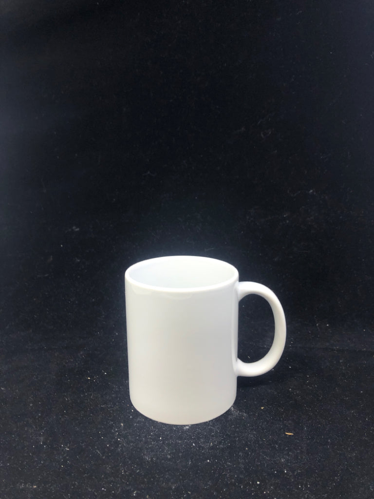 WHITE CERAMIC MUG.