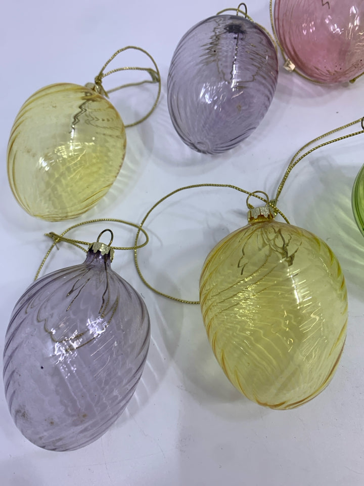 8 COLORFUL EGG SHAPED ORNAMENTS.