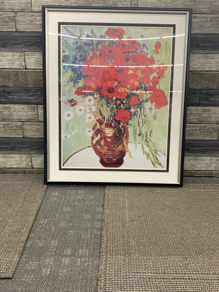 LARGE RED FLORAL BOUQUET PRINT IN BLACK FRAME.
