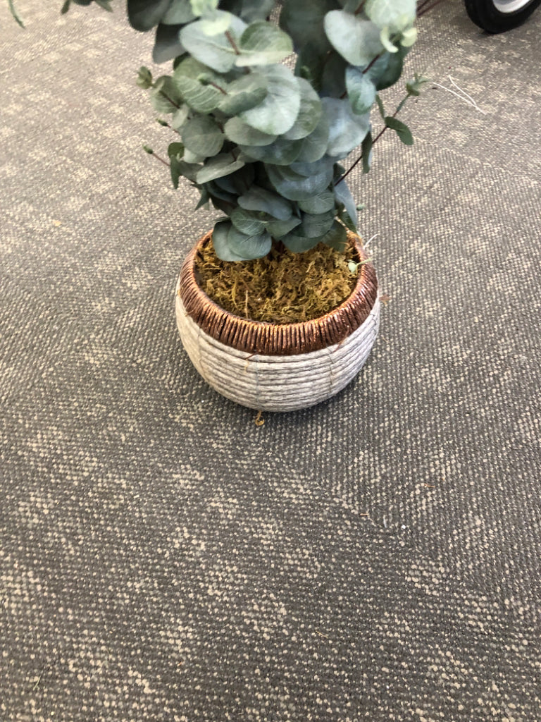 WOVEN PLANTER W/ FAUX EUCALYPTUS.