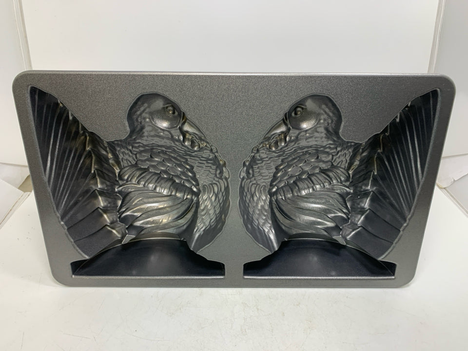 NORDIC WARE TURKEY CAKE PAN.