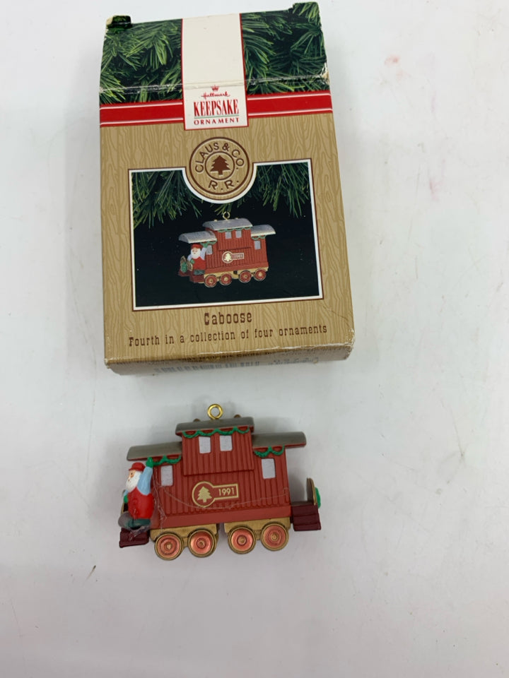 HALLMARK CABOOSE ORNAMNET IN BOX.