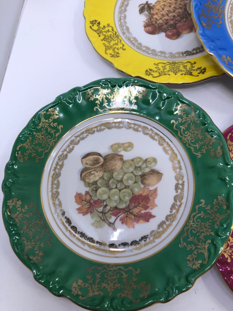 6 SMALL GOLD & COLORED RIM PLATES W FRUIT.