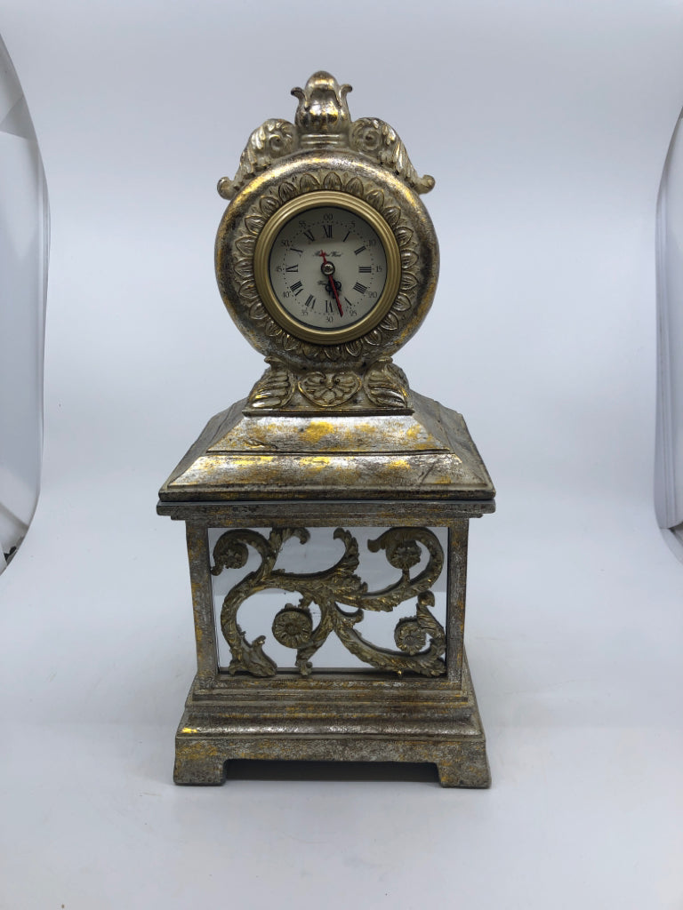 DISTRESSED RESIN GOLD FOOTED STORAGE BOX W/ CLOCK ON COVER.