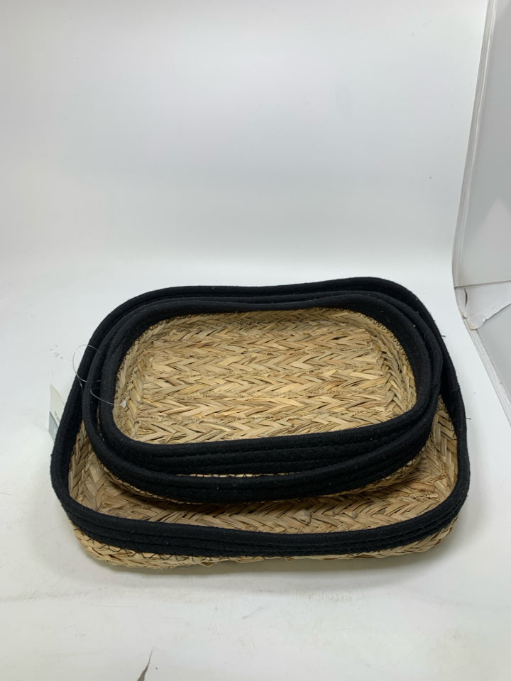 3 SHALLOW NESTING BASKETS W/ BLACK WOVEN EDGES.